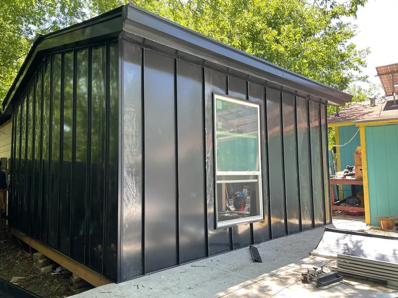 Black standing seam metal wall panels for Roof Inspection in Catalina