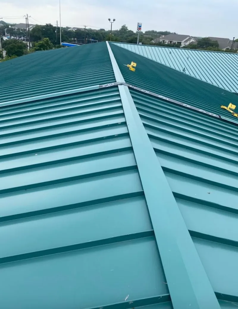 Green commercial metal roof ridge and valley for Metal Roof Repair in Catalina